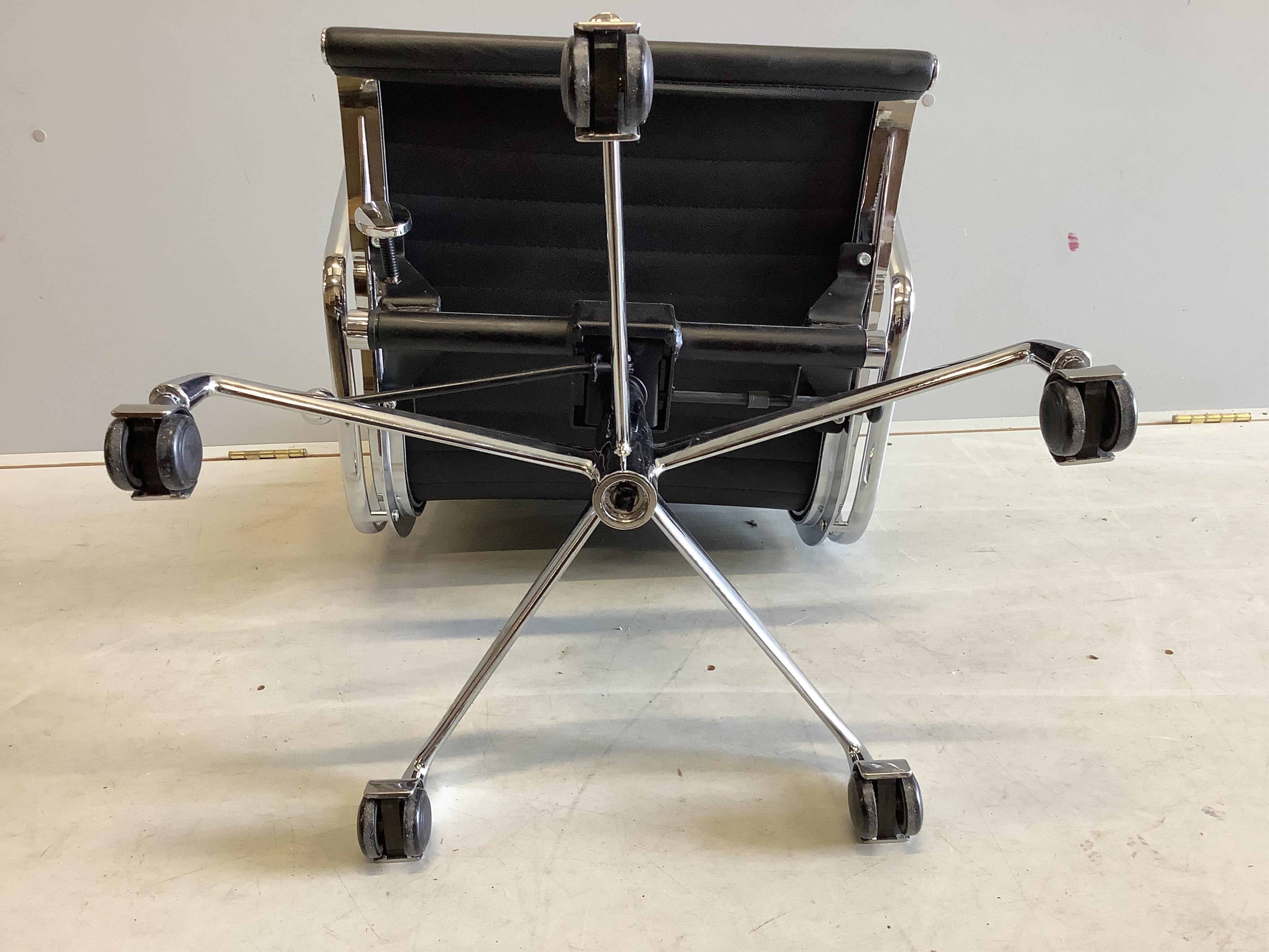 An Eames style desk chair, width 58cm, depth 50cm, height 90cm